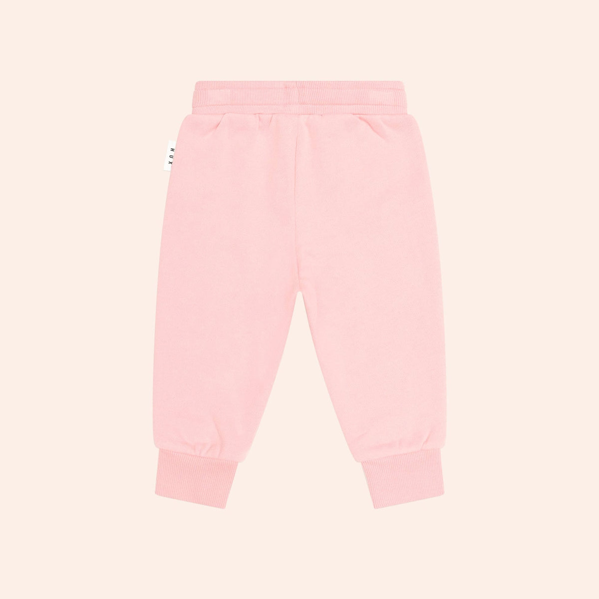 Huxbaby pink sweatpants with elastic waistband and cuffs