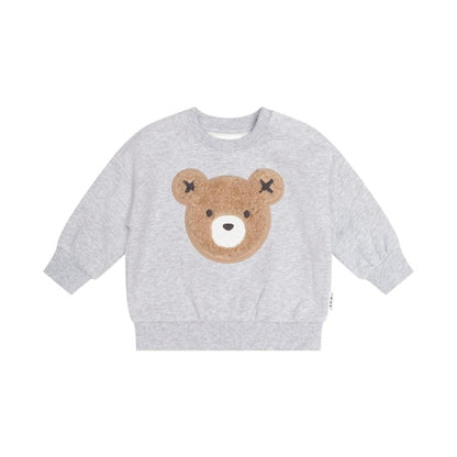Huxbaby grey marle sweatshirt with a brown fuzzy bear applique on the front