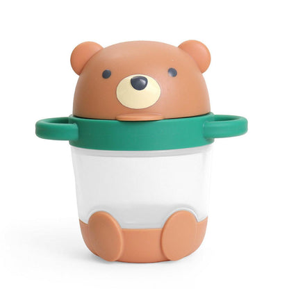 Itzy Ritzy bear shaped snack container with green handles and clear base