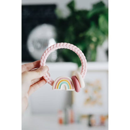 Itzy Ritzy pink braided silicone teether with rainbow charm