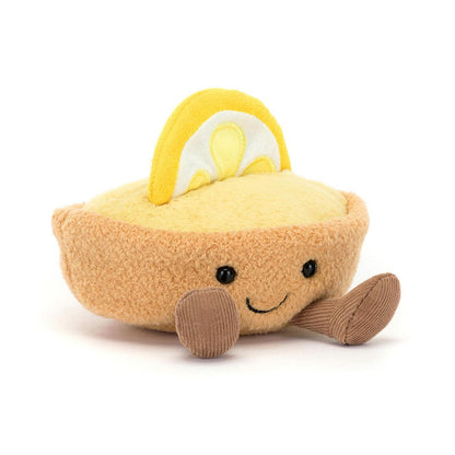 Jellycat plush lemon meringue pie with a smiling face and corduroy legs