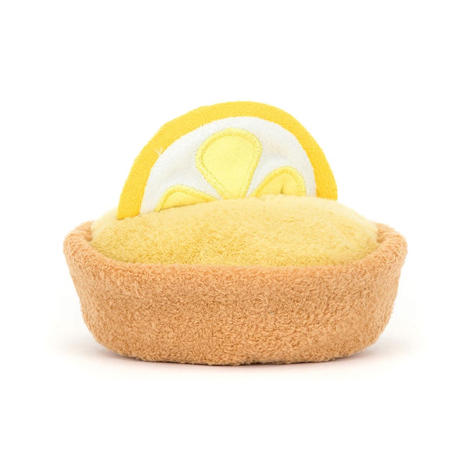 Jellycat plush lemon tart with a soft tan crust and yellow filling topped with a lemon slice