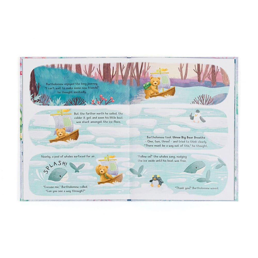 Open children book pages showing a teddy bear in a boat navigating through ice with whales and a penguin