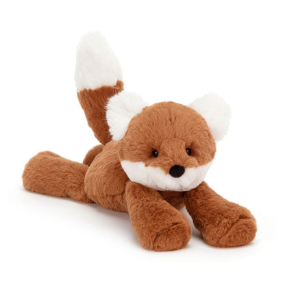 Jellycat plush fox toy with brown fur and white tail tip