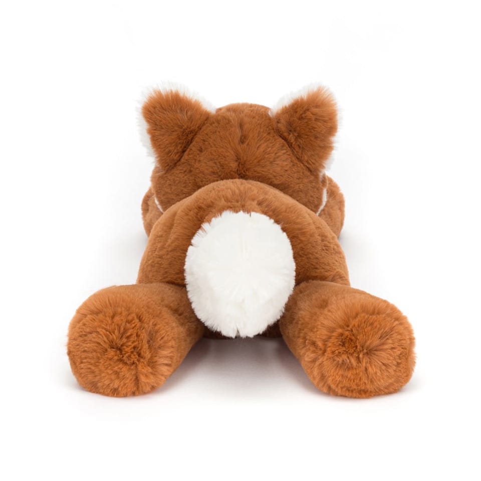 Back view of a brown plush fox toy with a white tail tip