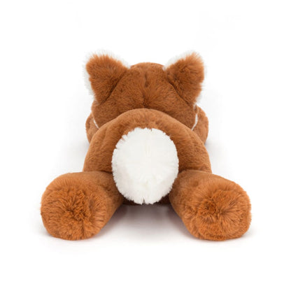 Back view of a brown plush fox toy with a white tail tip