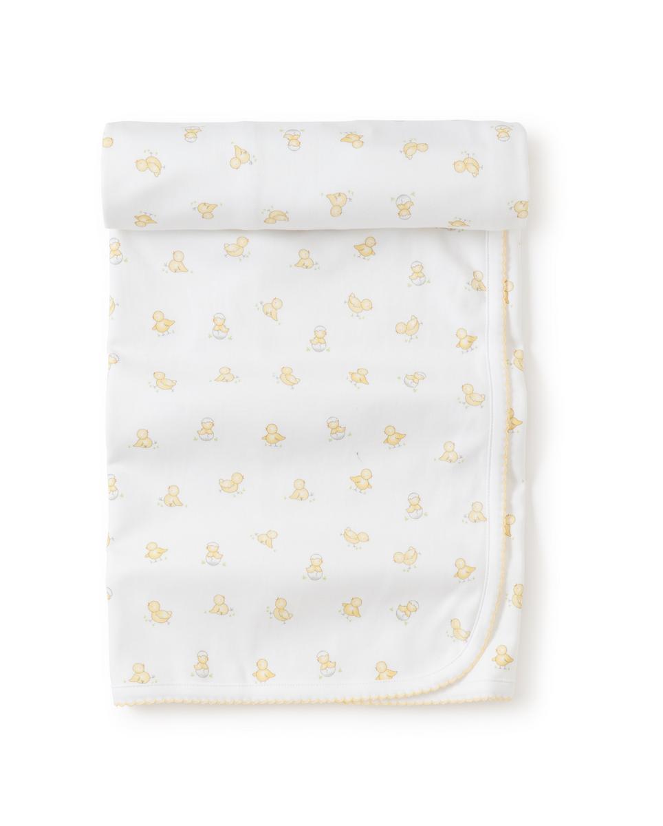 Kissy Kissy white baby blanket with yellow chick print and scalloped trim