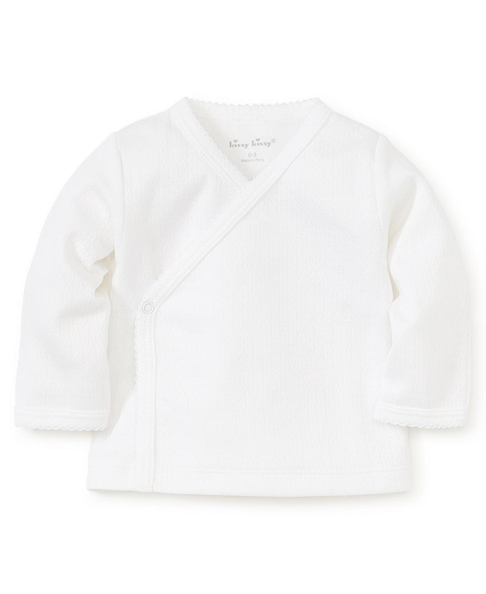 White Kissy Kissy long sleeve wrap shirt with snap closure
