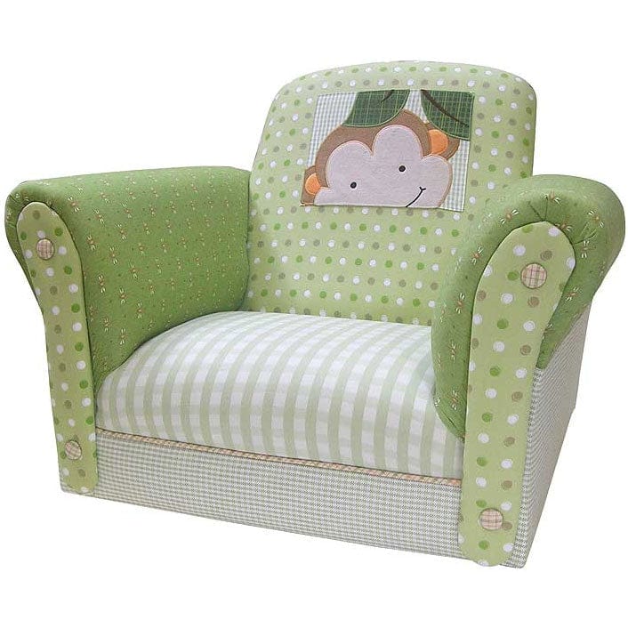 a green and white polka dot chair with a monkey on the back