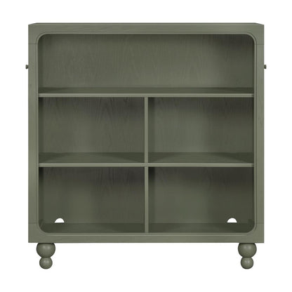Babyletto olive green wooden bookcase with four open storage compartments and rounded feet