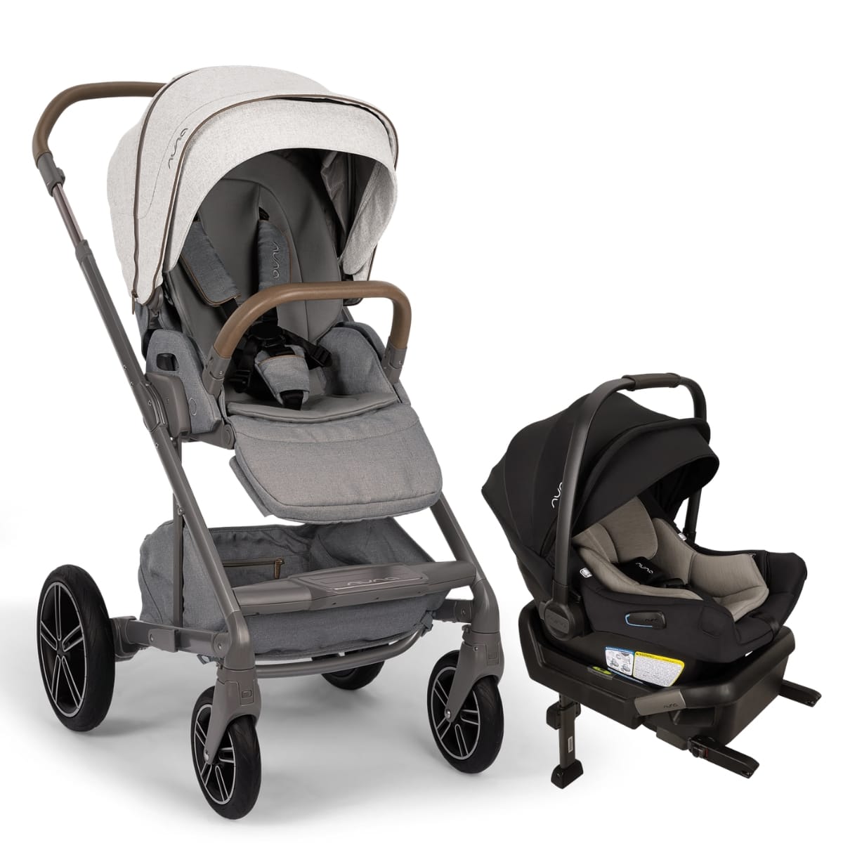 Nuna stroller with light grey seat and matching black infant car seat on base