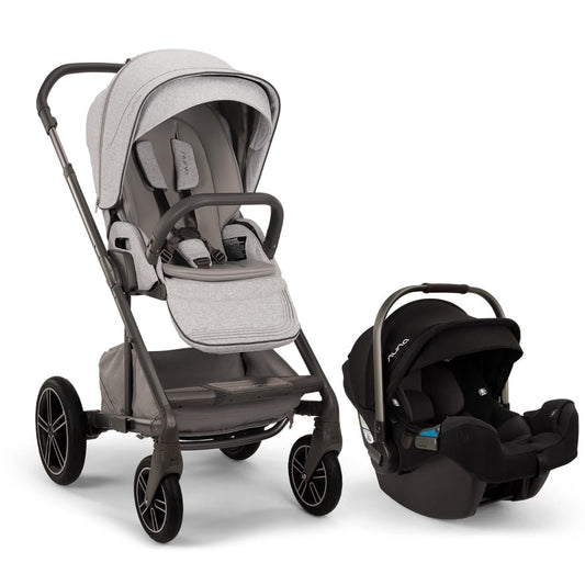 Nuna stroller with light grey seat and matching black infant car seat