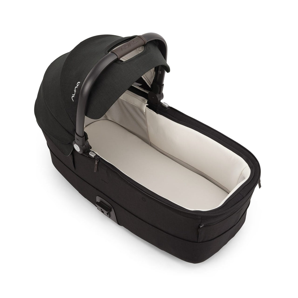Nuna black carry cot with cream interior and canopy