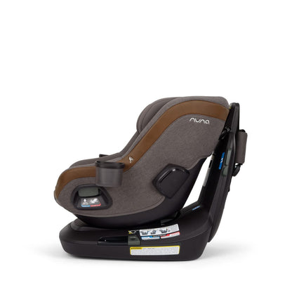 Nuna convertible car seat in grey and brown fabric side view