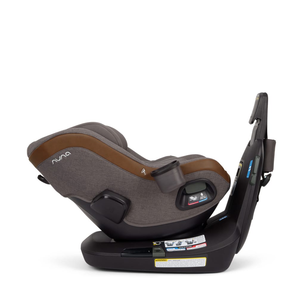 Nuna rotating car seat in grey and brown fabric with base