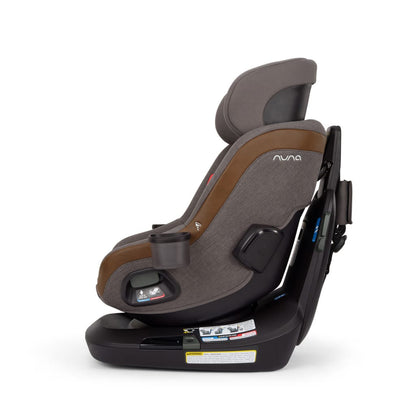 Side view of Nuna car seat in grey and brown fabric