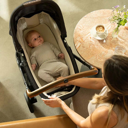 Nuna SWIV & TRIV Series Bassinet + Stand - Umber (Nuna x BMW) - CD15303UMB