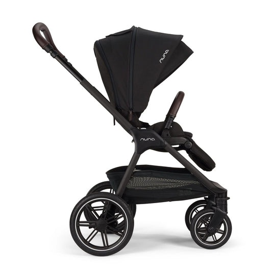Nuna black stroller and matching infant car seat on white background