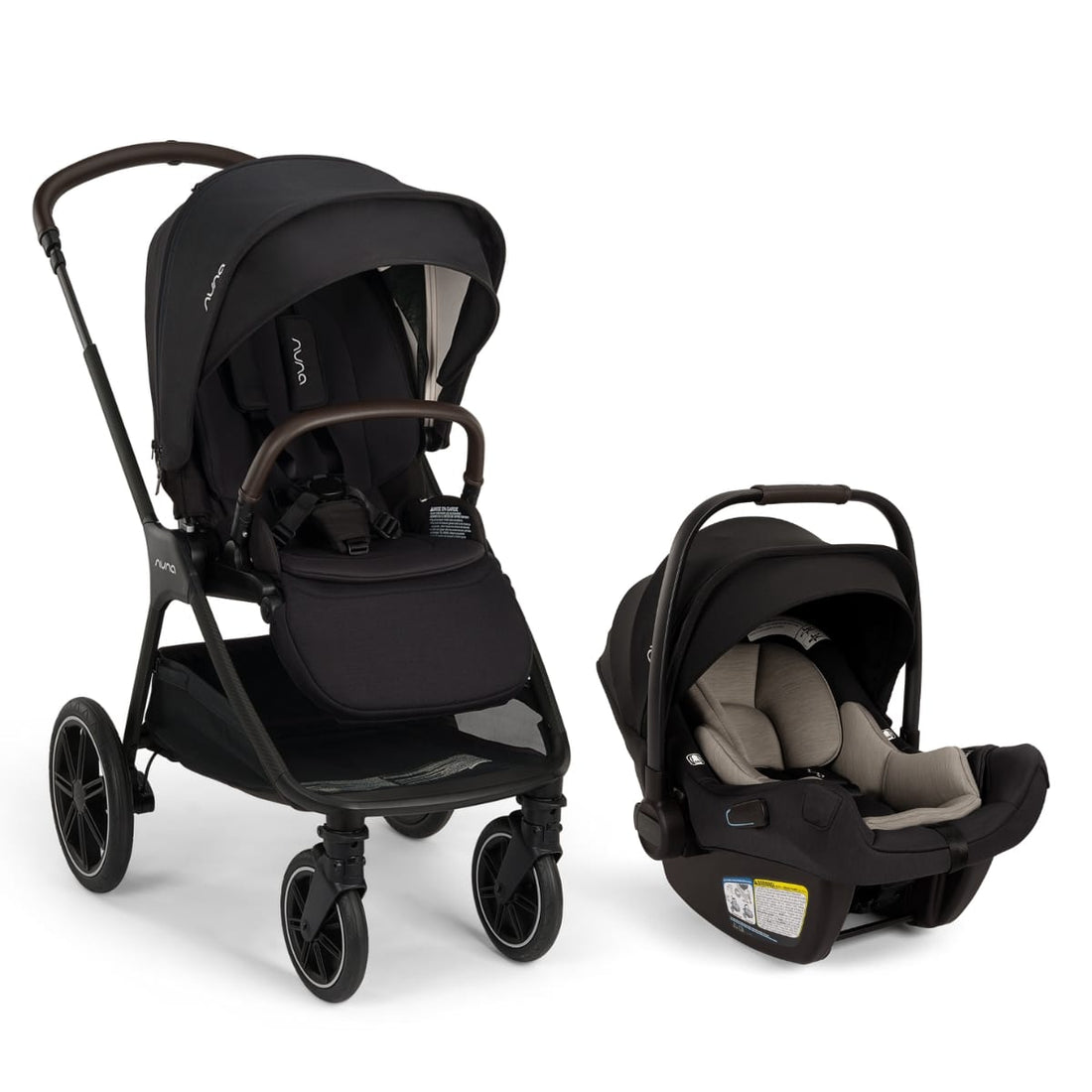 Nuna black stroller and matching infant car seat on white background