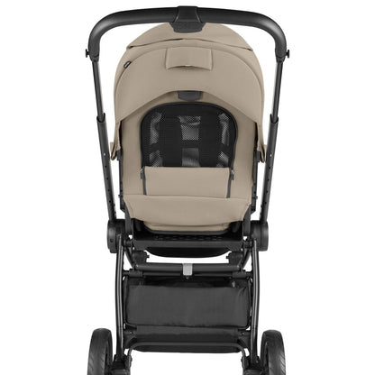 Rear view of a beige PEG stroller with a black frame and mesh ventilation window