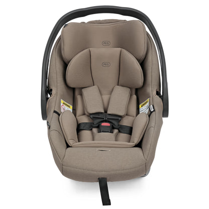 Tan PEG infant car seat with black handle and five point harness system