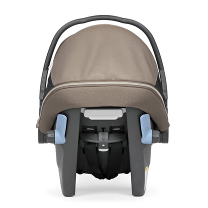 PEG infant car seat with brown canopy and blue adjustment levers