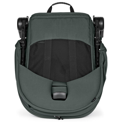 Folded dark green PEG stroller seat with mesh ventilation panel
