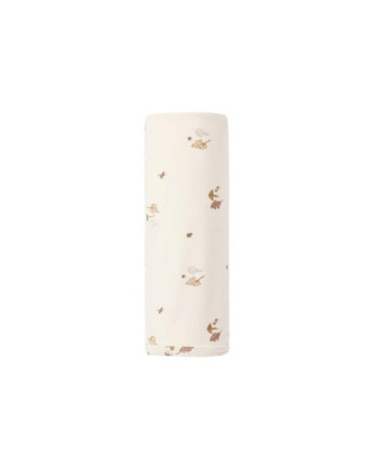 Quincy Mae cream swaddle blanket with small brown and grey leaf and mushroom print