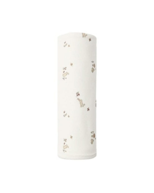 White baby swaddle blanket with small brown rabbit and mushroom print