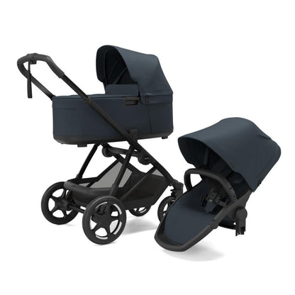 Thule stroller with bassinet attached and separate toddler seat