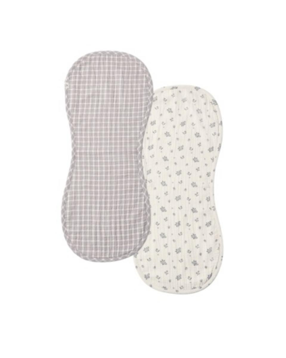 Two contoured burp cloths with grey gingham and floral patterns