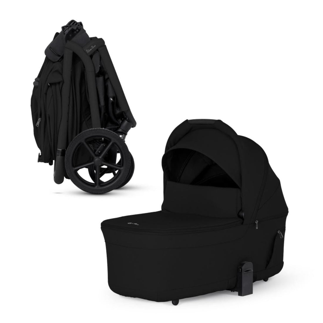 Onyx compact bassinet by Silver Cross, sleek black fabric, side view, with folded stroller frame and large wheels visible.