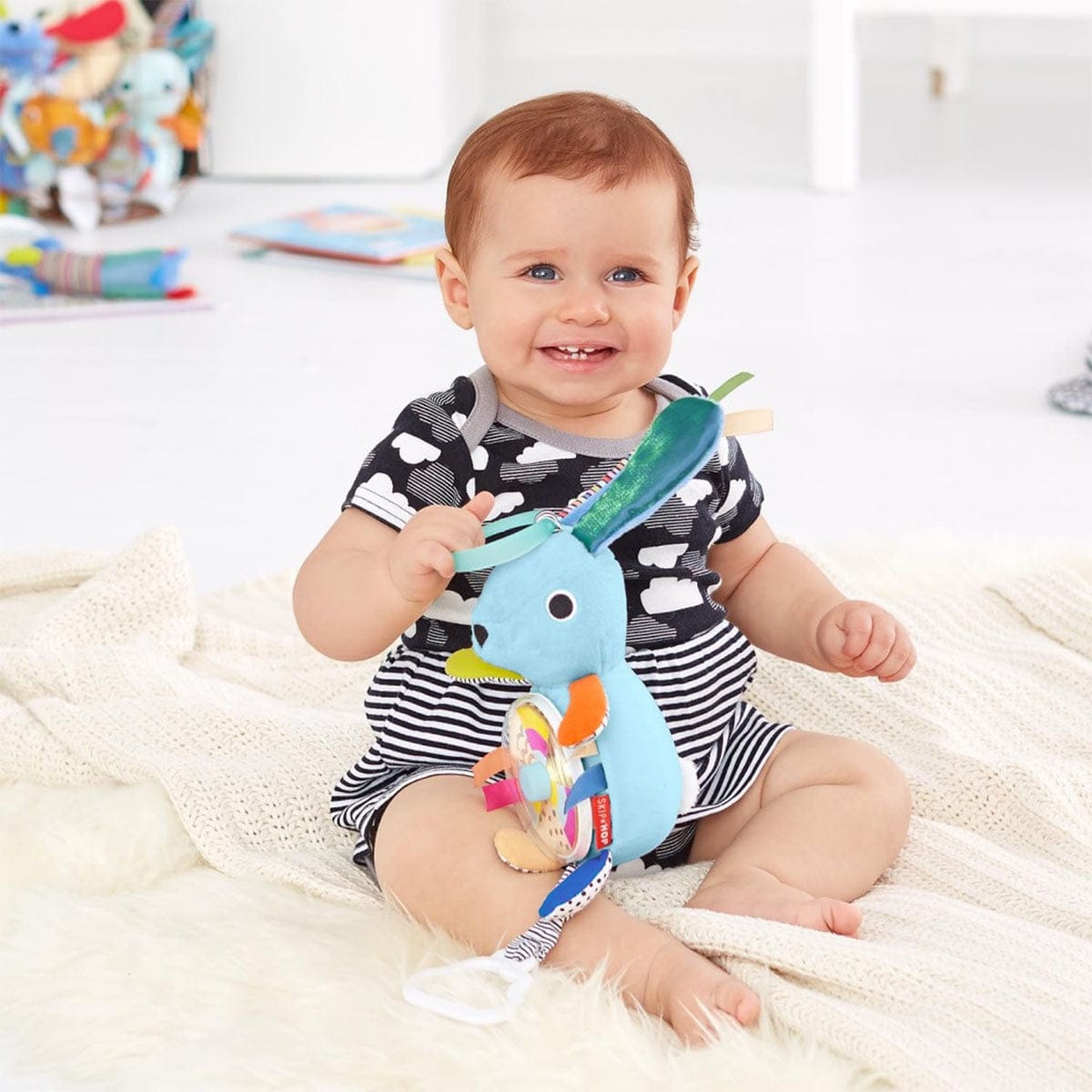 Skip Hop Vibrant Village Pull & Spin Activity Bunny