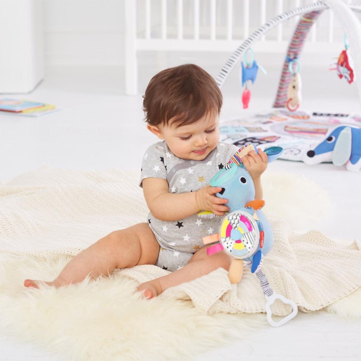 Skip Hop Vibrant Village Pull & Spin Activity Bunny