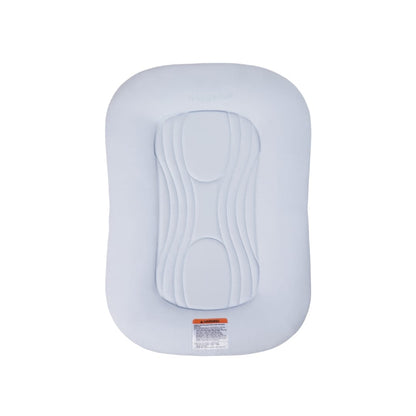 Light blue Snuggle Me infant lounger with central contoured cushion