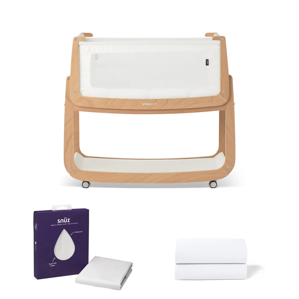 SnuzPod crib with mattress protector packaging and folded white sheets