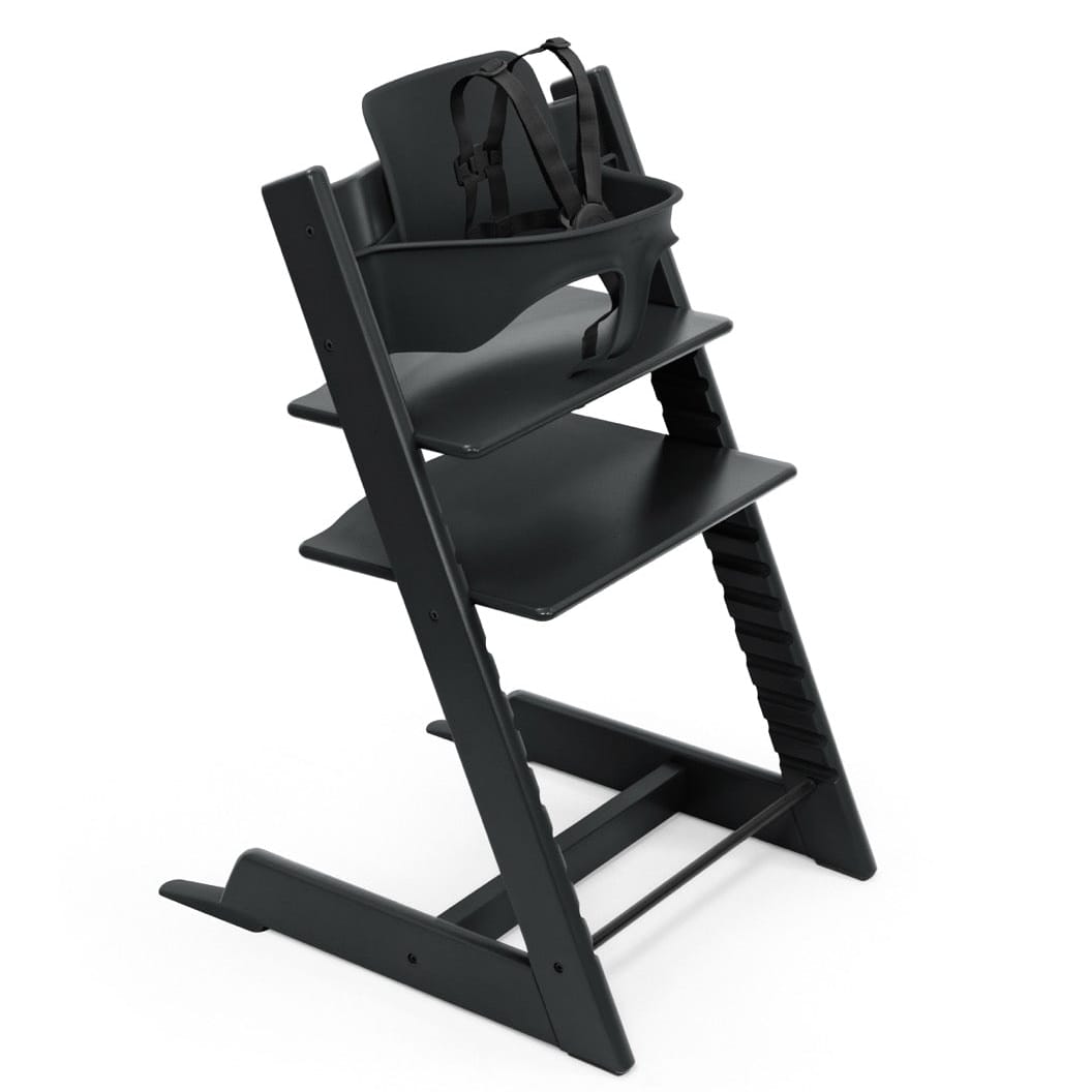 Black Stokke Tripp Trapp high chair with baby set and harness