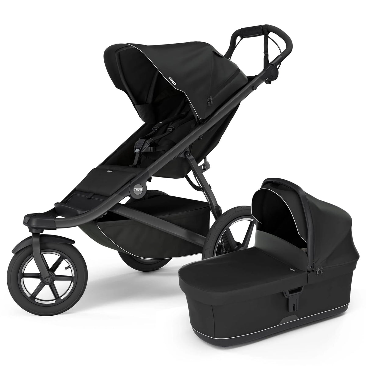 Thule black three-wheeled stroller with matching bassinet attachment