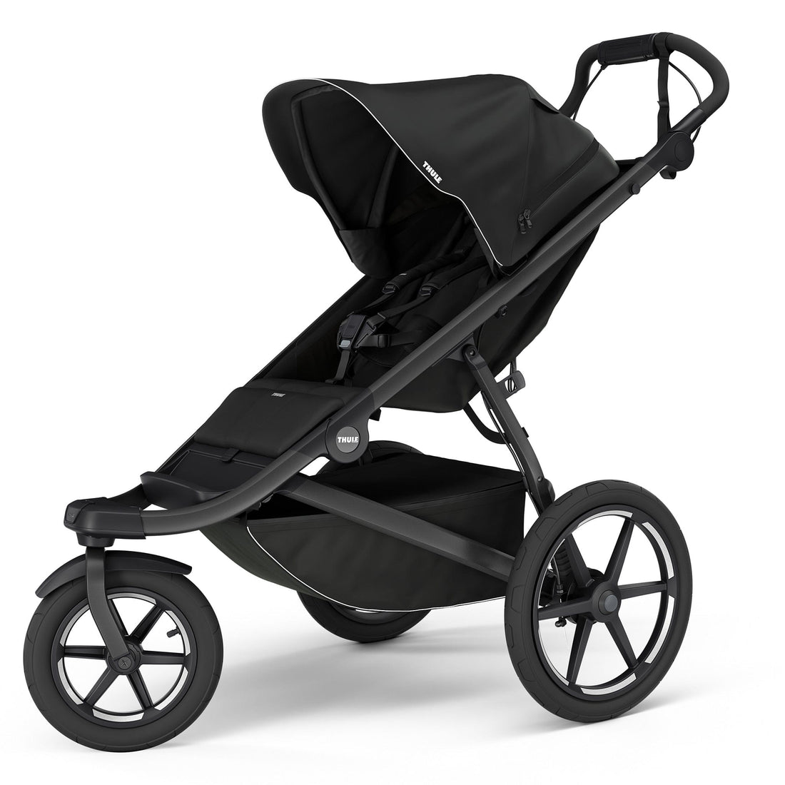 Black single jogging stroller by Thule with magnetic buckle, large all-terrain wheels, and adjustable canopy, side view
