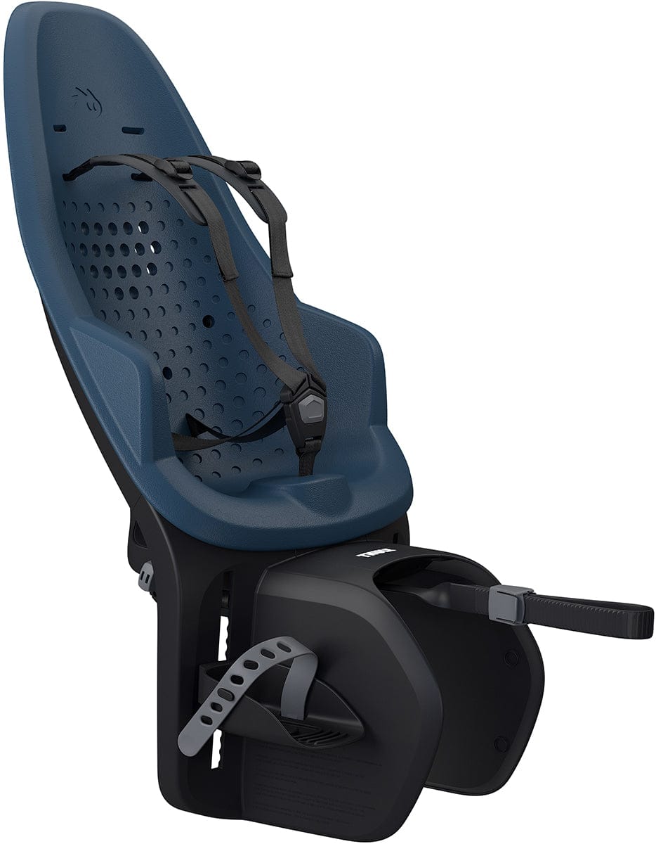 Majolica blue rack-mounted child bike seat by Thule, featuring perforated backrest, black harness, and side-mounted footrest, shown in side view.