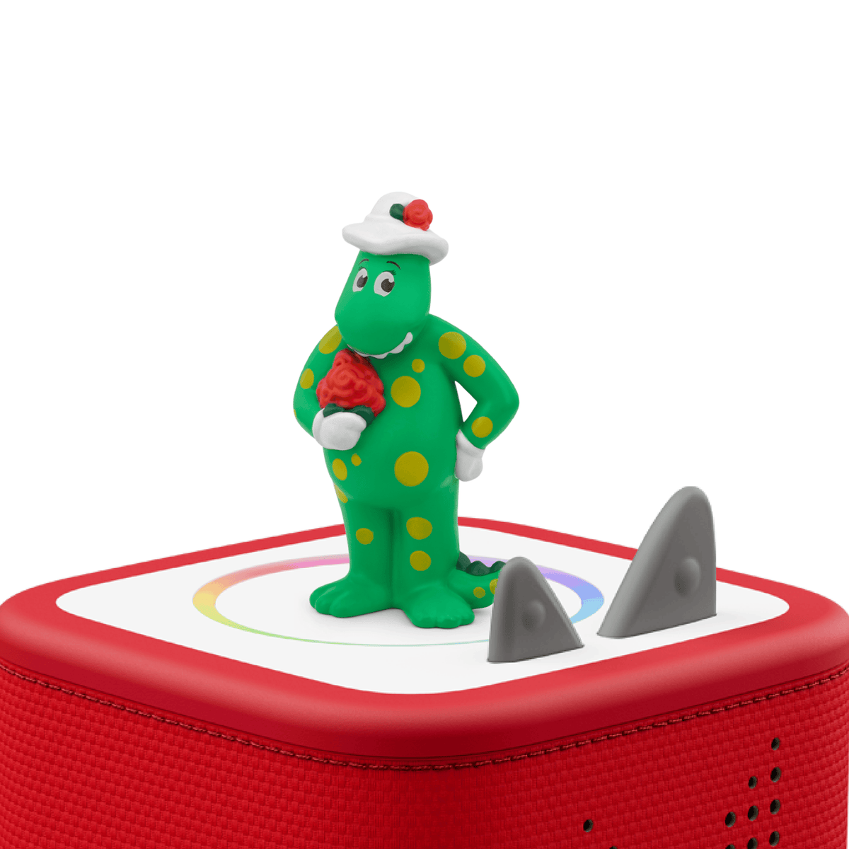 Dorothy the Dinosaur figurine on a red Toniebox speaker