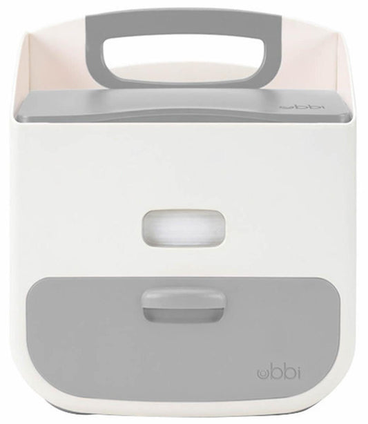 Ubbi white and grey plastic diaper caddy with a top handle