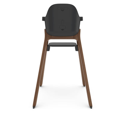 Back view of UPPAbaby high chair with dark grey seat and wooden legs