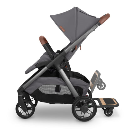 UPPAbaby grey stroller with attached ride along board
