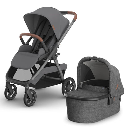 UPPAbaby grey stroller with matching bassinet