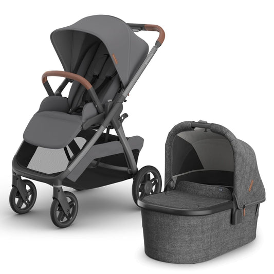 UPPAbaby grey stroller with matching bassinet