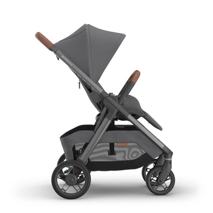 UPPAbaby grey stroller with brown leather handle and bumper bar