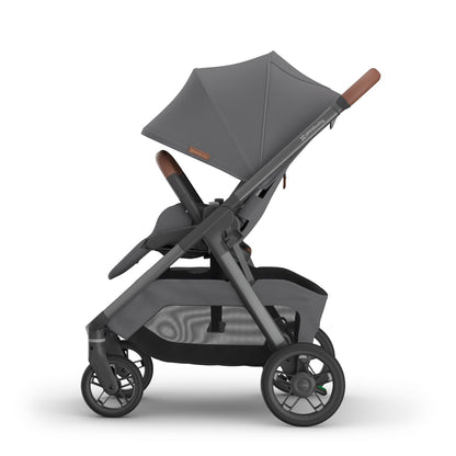 UPPAbaby grey stroller with brown leather handle and bumper bar