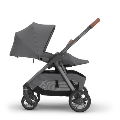 UPPAbaby gray stroller with leather handle and storage basket
