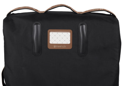 Black UPPAbaby travel bag with brown leather handles and luggage tag